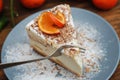 Tangerine citrus Cheescake Homemade on Gray Plate over Wooden Background. Top View. Dessert. Horizontal Image. Royalty Free Stock Photo