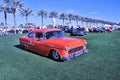 Tangerine Orange 1955 Chevy Leaving Dr. George Car Show Royalty Free Stock Photo