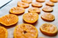 tangerine orange slice on baking sheet Royalty Free Stock Photo