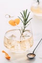 Tangerine and Rosemary Old Fashioned, drink, close-up, white marble background