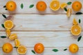 Tangerine slices decompose at the edges of the table