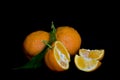 Tangerines against a black background Royalty Free Stock Photo