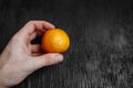 Tangerines on a black background. Lots of fresh fruit - mandarins. Royalty Free Stock Photo