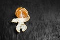 Tangerines on a black background. Lots of fresh fruit - mandarins. Royalty Free Stock Photo