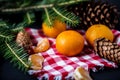 Tangerines With Christmas Decoration On Rustic Wooden Background. Tangerines With Spruce. Christmas Decoration