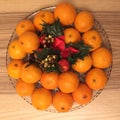 tangerines on a crystal dish