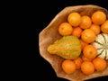 Tangerines and decorative pumpkins Royalty Free Stock Photo