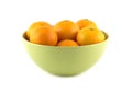 Tangerines in green china bowl isolated