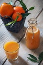 Tangerines and kaky juice Royalty Free Stock Photo
