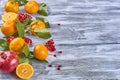 Tangerines with leaves on a wooden background Royalty Free Stock Photo