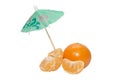 Tangerines with thr umbrella on white background