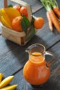 Tangerines, mango and carrot juice Royalty Free Stock Photo