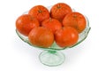 Tangerines Murcott in vintage glass vase for fruits