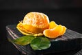 Tangerines on an old fashioned country table. Selective focus. Horizontal.