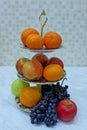 Tangerines, oranges, red and green apples and grapes Royalty Free Stock Photo