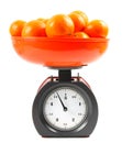 Tangerines on scales Royalty Free Stock Photo