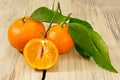 Tangerines on wooden background. Royalty Free Stock Photo