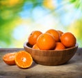 Tangerines in wooden bowl Royalty Free Stock Photo