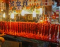 Tanghulu traditional Chinese hard caramel coated fruit skewers close-up also called bing tanghulu candied hawthorn sticks. Chinese