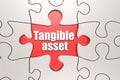 Tangible asset word on jigsaw puzzle