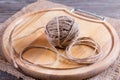 Tangle of thread on a wooden board Royalty Free Stock Photo