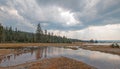 Tangled Creek emptying into Hot Lake hot spring in the Lower Geyser Basin in Yellowstone National Park in Wyoming USA Royalty Free Stock Photo