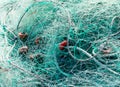 Tangled green fishing nets Royalty Free Stock Photo