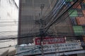 Tangled and messy electrical cables in Bangkok city