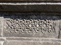 Tangled snakes design carving on stone Royalty Free Stock Photo