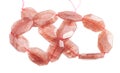 Tangled string from faceted pink aventurine beads