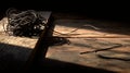 Tangled String in Sunlit Still Life on Rustic Wooden Surface Royalty Free Stock Photo