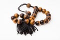 Tangled worry beads from tiger`s eye gemstones Royalty Free Stock Photo