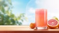 grapefruit juice and slices on a wooden table