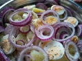 Tangy hand prepared potato salad in a silver bowl