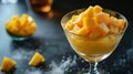 tangy mango sorbet adorned with diced fresh mango, offering a tropical indulgence that tantalizes the taste buds.