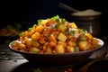 Tangy and spicy aloo chaat, a street food favorite featuring crisp potato cubes tossed