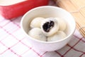 Tangyuan, Chinese dessert made of ball glutinous rice flour and filled with black sesame