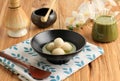 Tangyuan Tang Yuan, Glutinous Dice Dumpling Balls with Sweet Green Tea Syrup Soup in a Bowl on Wooden Table Background for