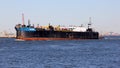 Tank barge GM11105 entering Kill Van Kull strait from the East, Brooklyn skyline in the background, Staten Island, NY