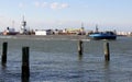 Tank barge GM 6507 passing Kill Van Kull strait eastward on background of Bayonne, NJ