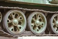 Tank caterpillar, iron wheels, tank undercarriage close up