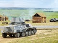 Tank fighting on village