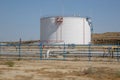 Big Industrial oil tanks in a refinery .Large white industrial tanks for petrochemical or oil or fuel or water in refinery or Royalty Free Stock Photo