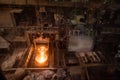 Tank pours liquid metal at the steel mill