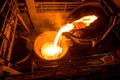 Tank pours liquid metal at the steel mill