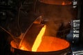 Tank pours metal at the steel mill.