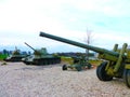 Tank T 32 and then a cannon howitzers Soviet combat weapon of WWII Royalty Free Stock Photo