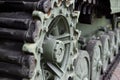 Tank track and wheels closeup. Royalty Free Stock Photo