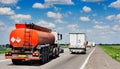 The tank truck is moving along the highway. Royalty Free Stock Photo