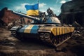A tank with a Ukrainian flag and patriotic yellow and blue paint on the background of destroyed houses. Royalty Free Stock Photo